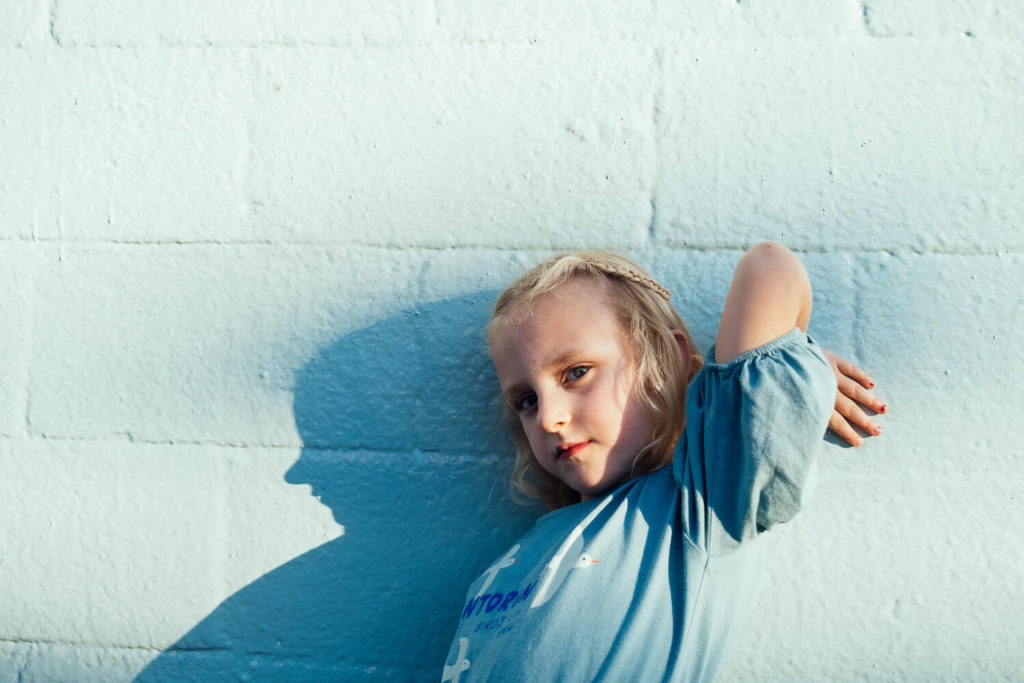 toddler exploring playground bridge, adventurous kids photography